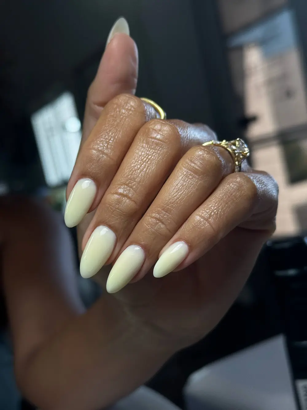 Milky butter-cream almond nails with gold rings