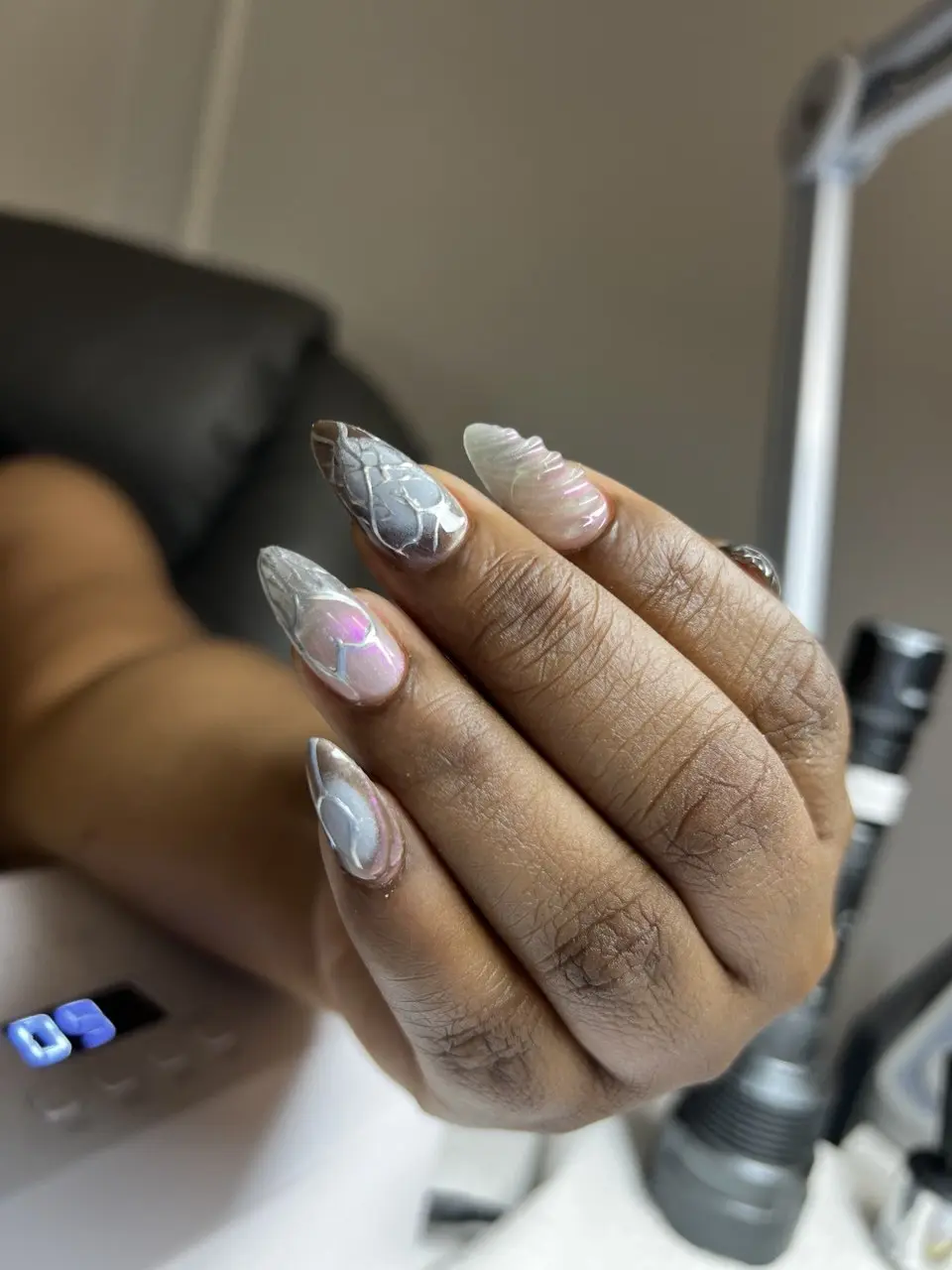 Sculpted chrome nail art, macro