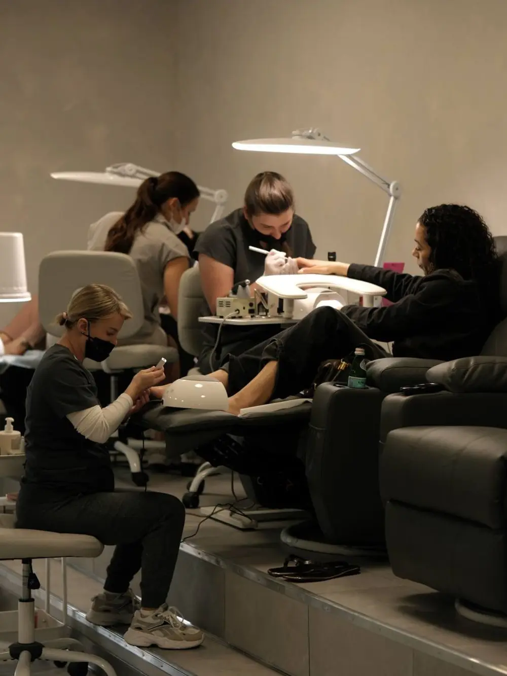 Inside the No Choice Beauty Studio in Huntington Beach: techs working at their stations