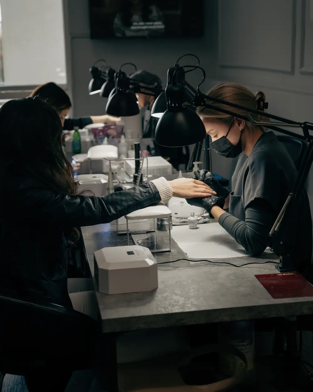 Inside the No Choice Beauty Studio in Los Angeles: techs at work along the manicure bar